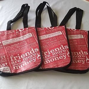 A set of three Lululemon shopping/reusable Bags